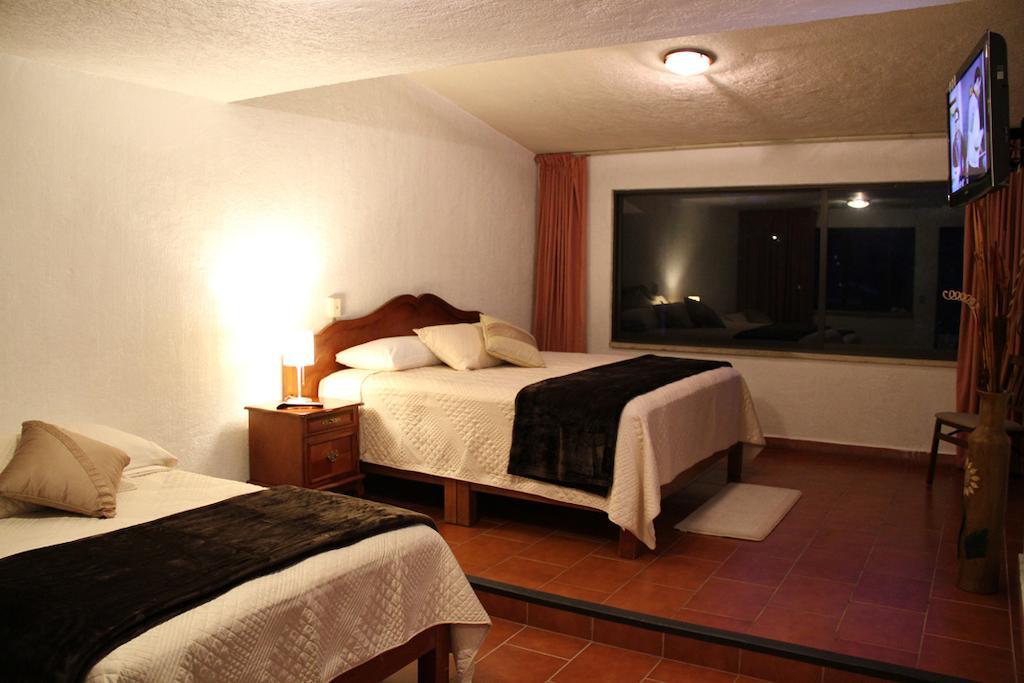 Hotel Quinta Del Sol Tepoztlán Habitación foto